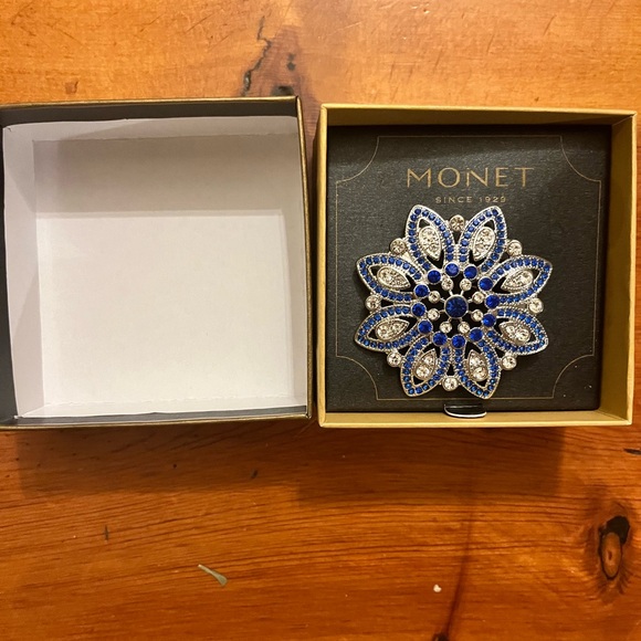 Monet Jewelry - 🆕 Monet Flower shaped Brooch Silver tone with blue and clear rhinestones.